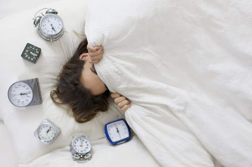 Tiếp tục ngủ sau khi tắt đồng hồ báo thức khiến bạn mệt mỏi